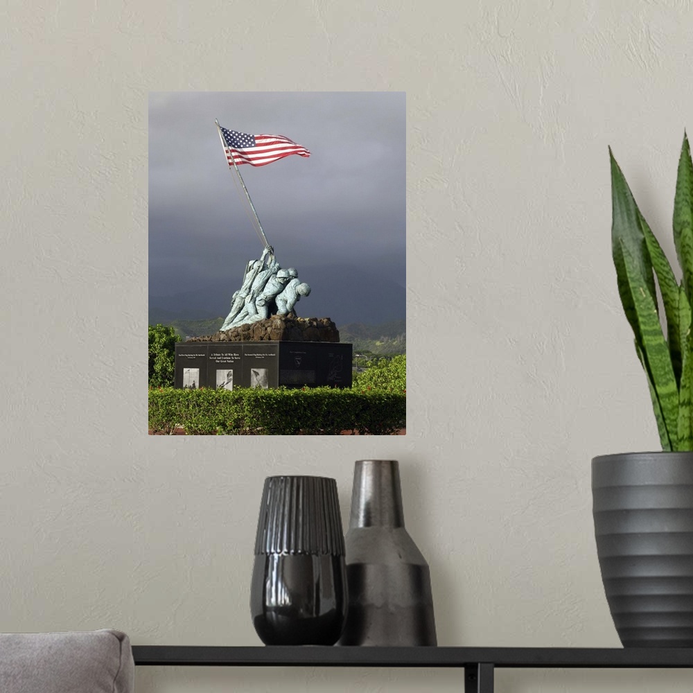 A modern room featuring Big, vertical photograph of the Iwo Jima Statue, of a small group of soldiers hoisting the Americ...
