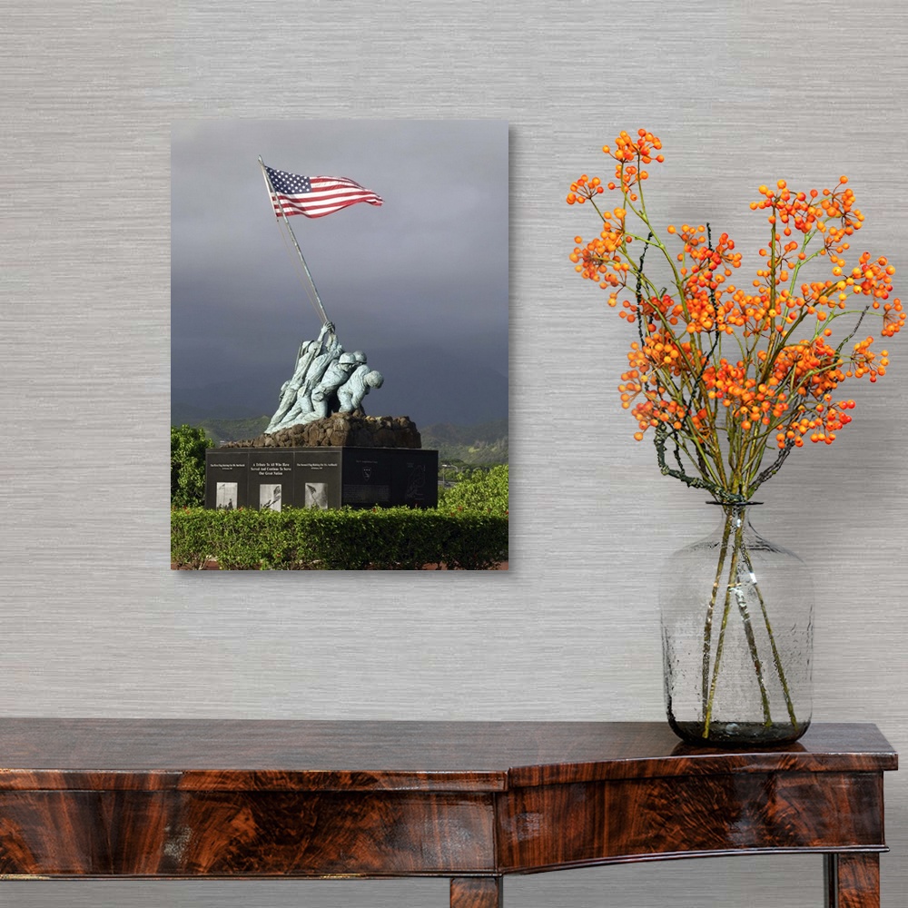A traditional room featuring Big, vertical photograph of the Iwo Jima Statue, of a small group of soldiers hoisting the Americ...