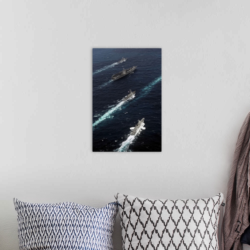 A bohemian room featuring The John C. Stennis Carrier Strike Group are underway in formation with naval vessels from the Re...