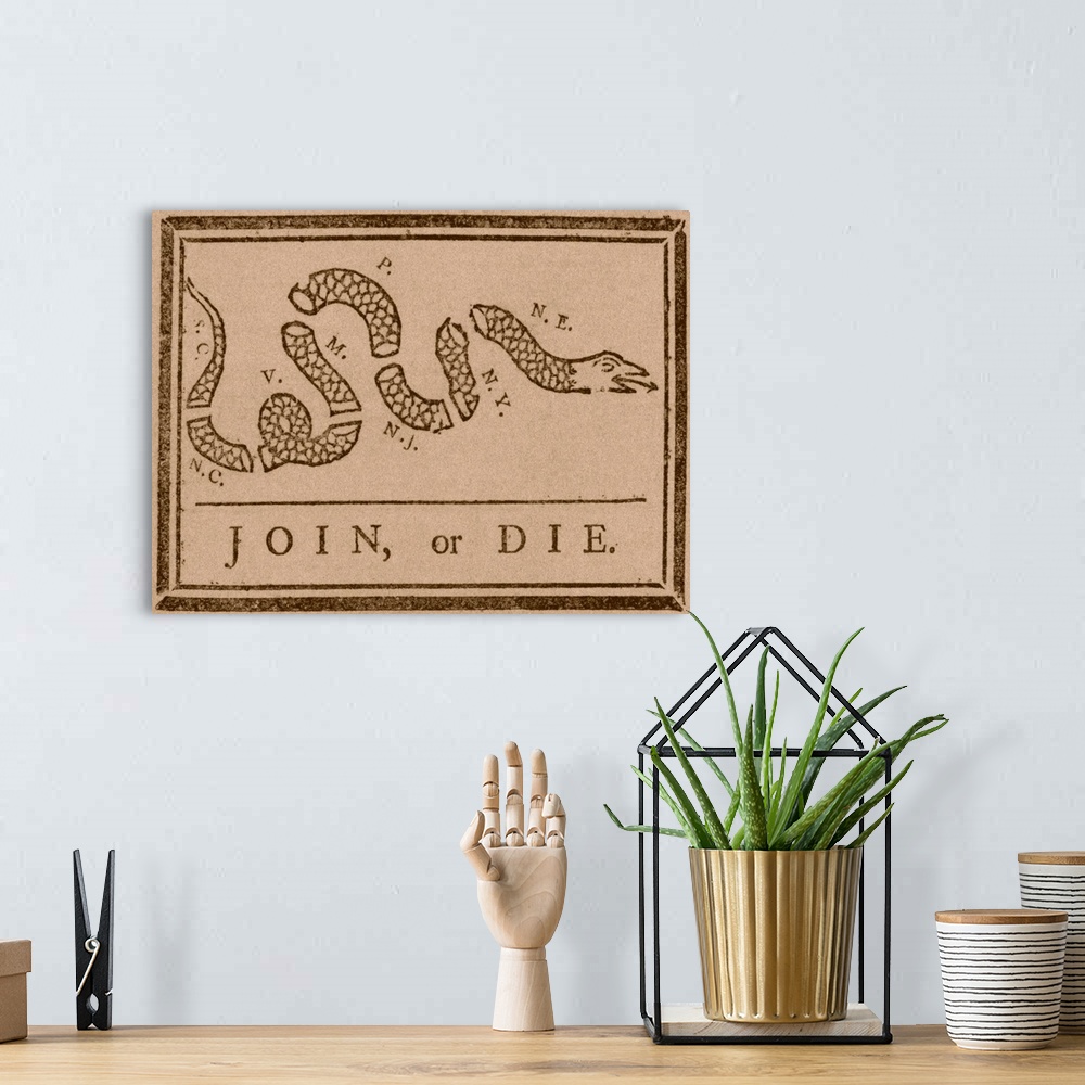 A bohemian room featuring The Join or Die print was a political cartoon created by Benjamin Franklin. The snake shown is se...