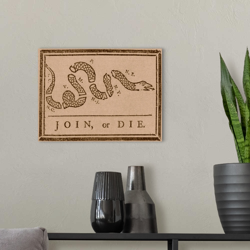 A modern room featuring The Join or Die print was a political cartoon created by Benjamin Franklin. The snake shown is se...