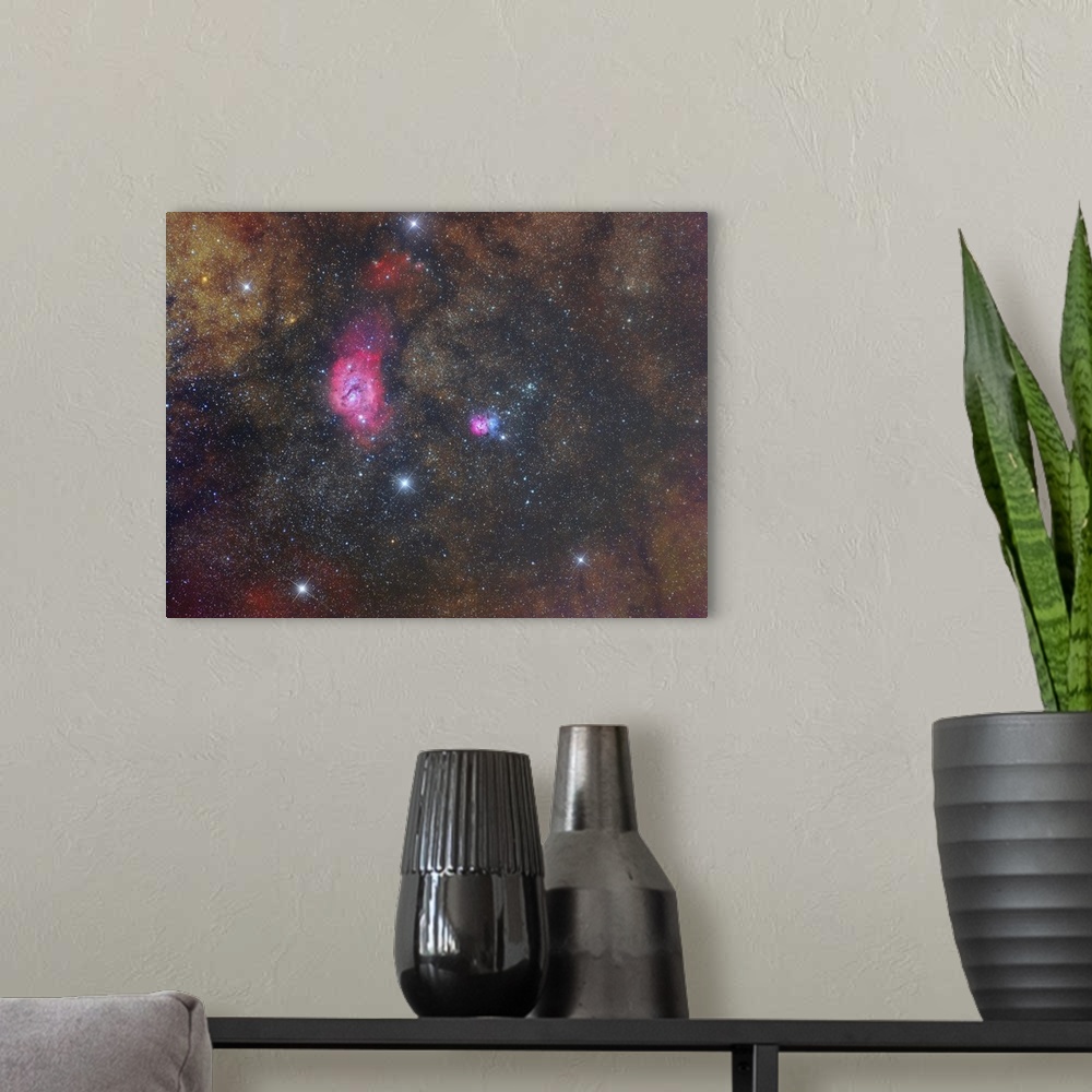 A modern room featuring The Lagoon Nebula and Trifid Nebula in Sagittarius constellation.
