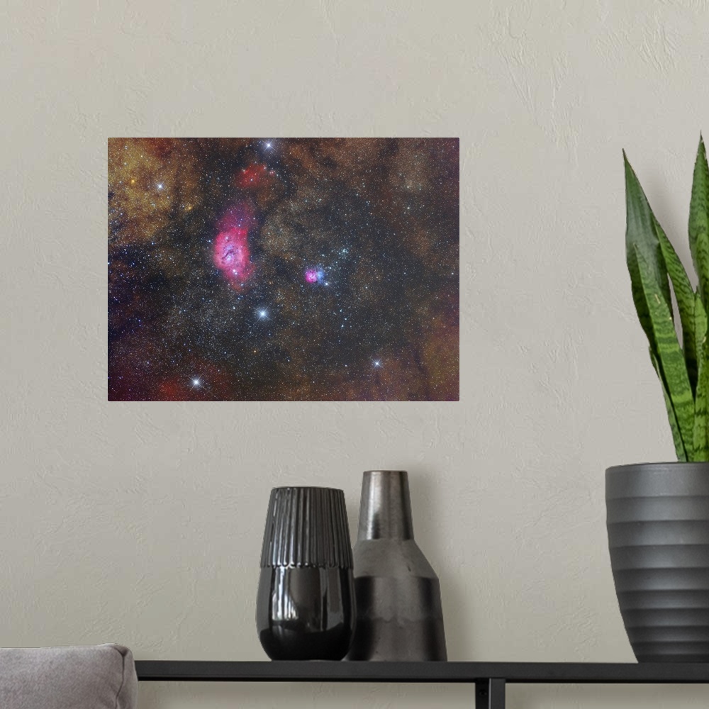 A modern room featuring The Lagoon Nebula and Trifid Nebula in Sagittarius constellation.