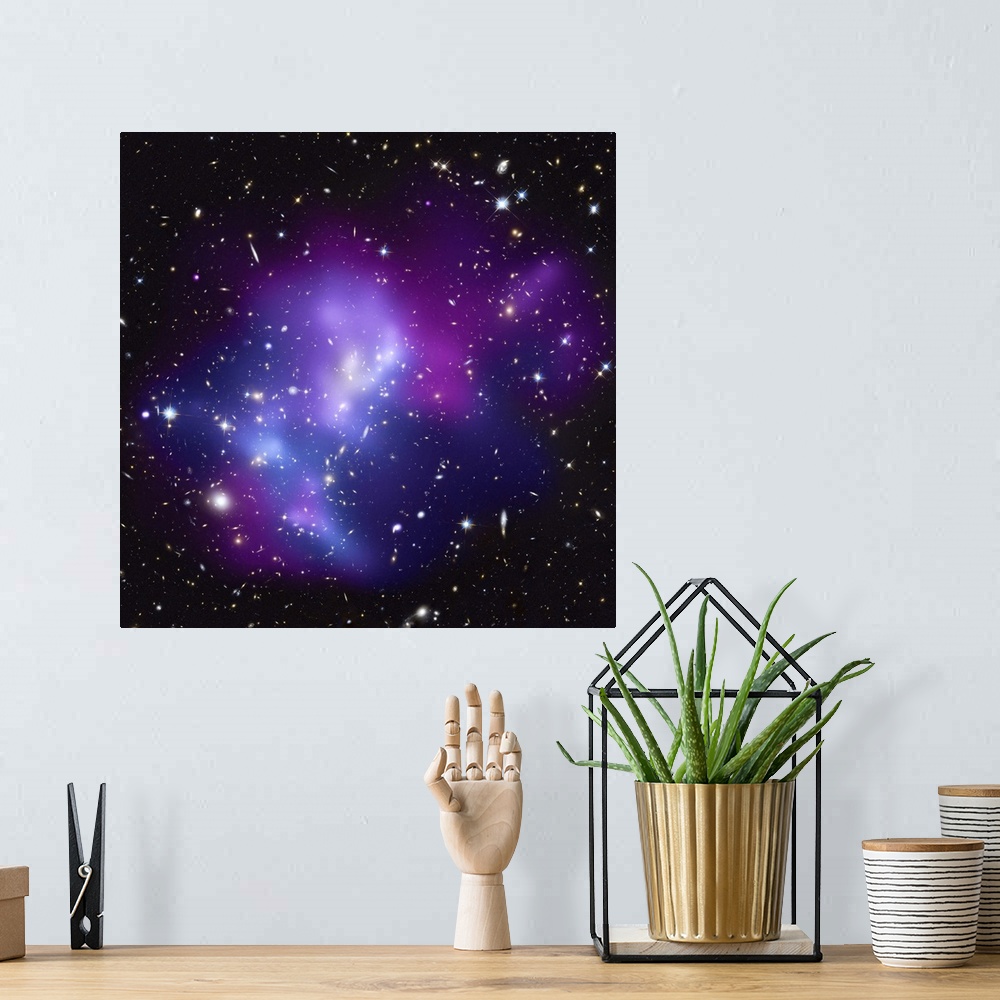 A bohemian room featuring Big, square wall picture of the huge galaxy cluster MACS J0717 surrounded with vibrant, multicolo...