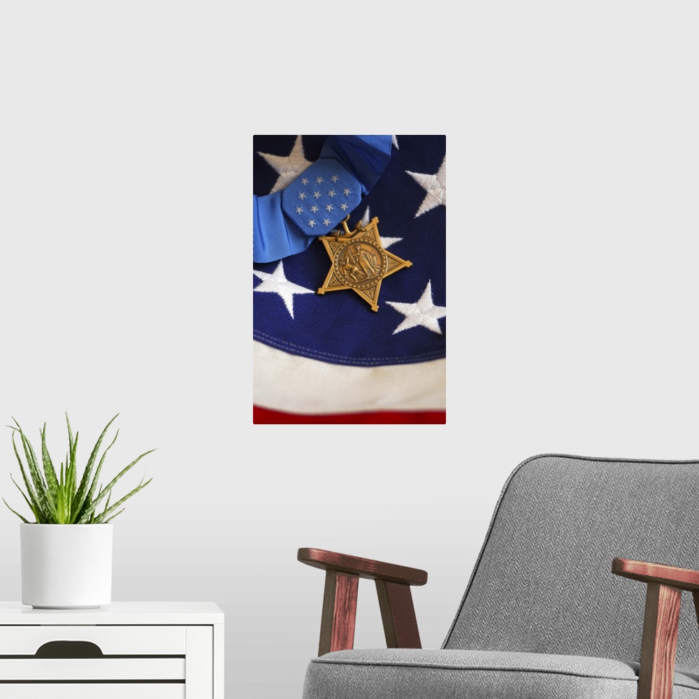 A modern room featuring The Medal of Honor rests on a flag during preparations for an award ceremony.