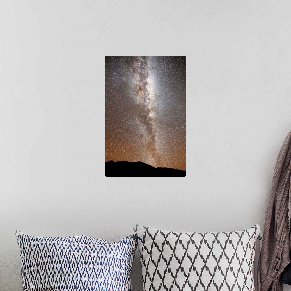 A bohemian room featuring The Milky Way in vertical position rising from the horizon, Sierra de la Ventana, Argentina.