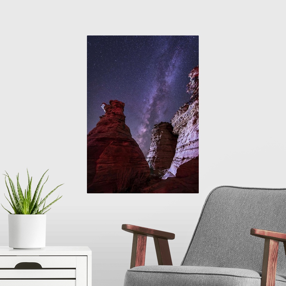 A modern room featuring The Milky Way rises above the Wedding Party rock formation in the Black Mesa area of Oklahoma.