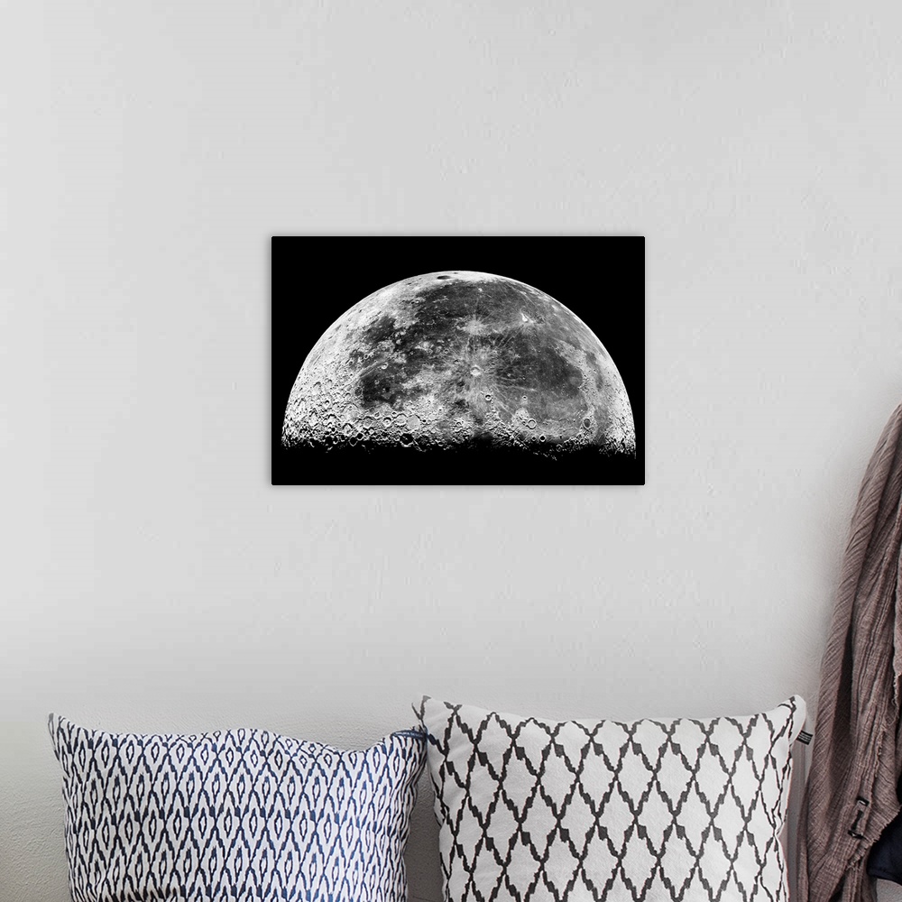 A bohemian room featuring Horizontal photograph of the Earthos moon displaying geographic features and craters.
