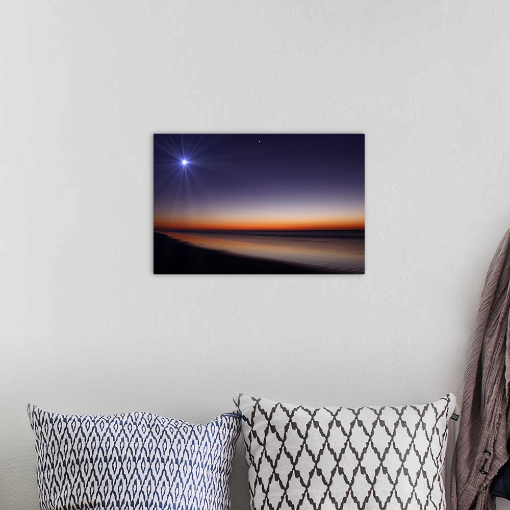 A bohemian room featuring Big photo on canvas of a bright moon and Venus in the dusk sky above an ocean.
