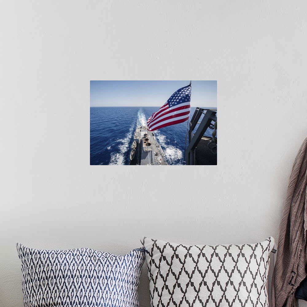 A bohemian room featuring May 23, 2013 - The national ensign flies from the mast aboard the guided-missile destroyer USS St...