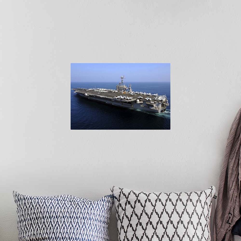 A bohemian room featuring The Nimitz-class aircraft carrier USS John C. Stennis.
