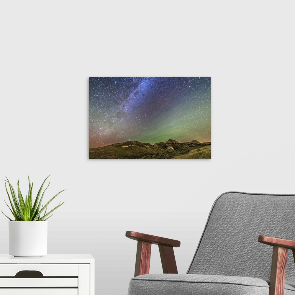 A modern room featuring The northern autumn stars and constellations rising in the east over the Badlands of Dinosaur Pro...
