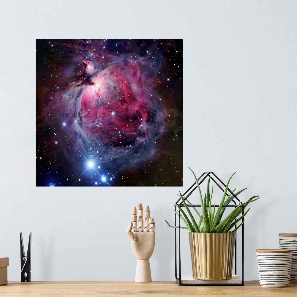 A bohemian room featuring The Orion Nebula, also known as Messier 42 or NGC 1976, is a diffuse nebula situated south of Ori...