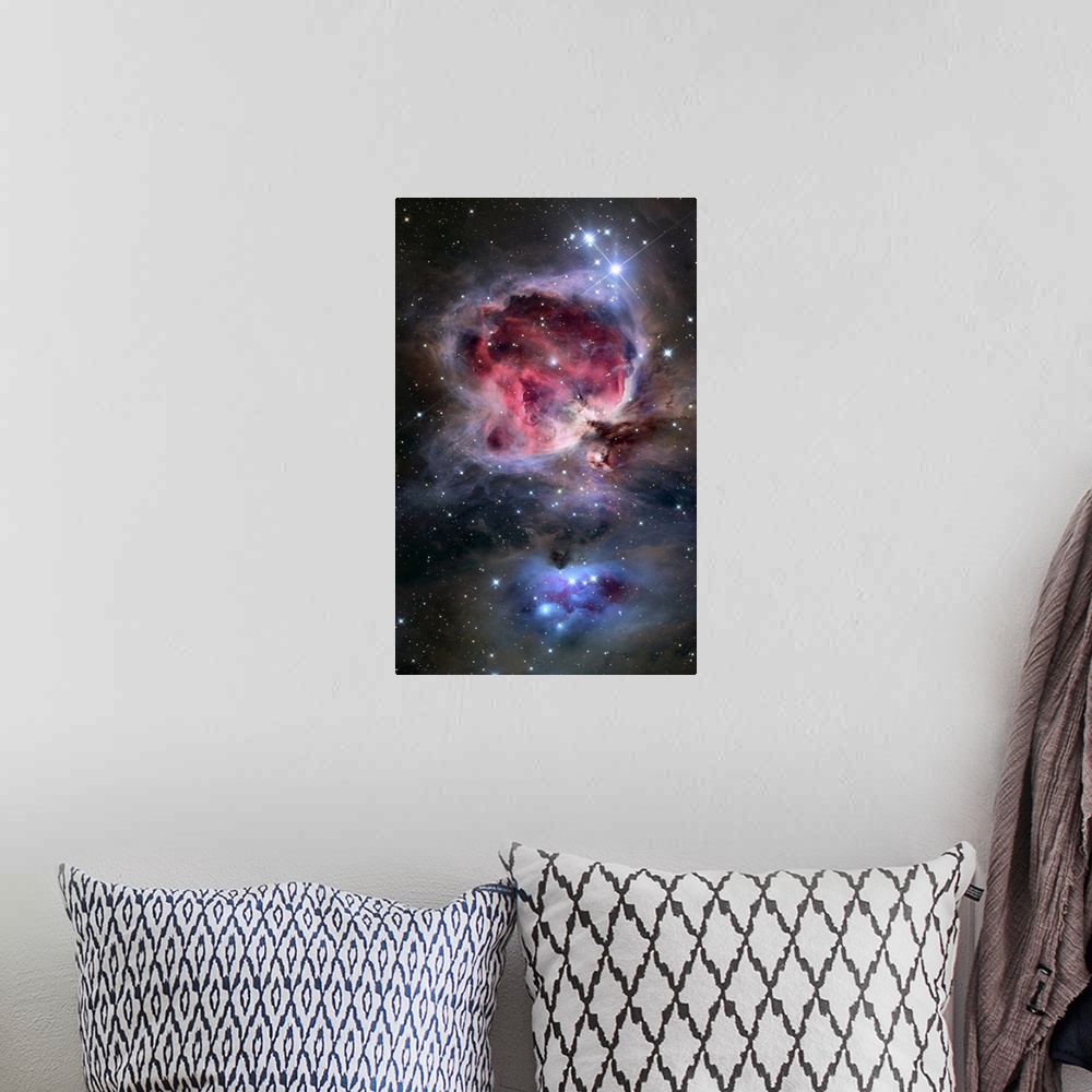 A bohemian room featuring Oversized vertical wall hanging of the swirling, brightly colored clouds in the Orion Nebula, sur...
