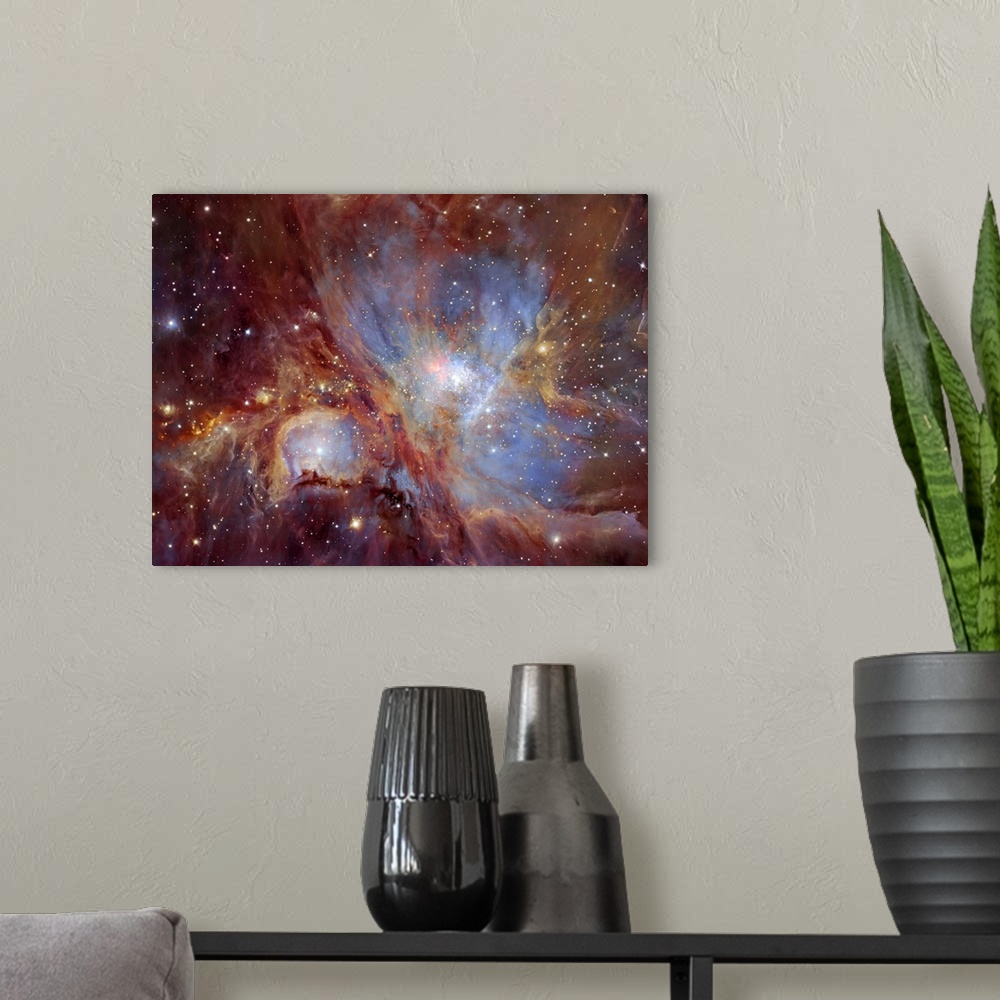 A modern room featuring The Orion Nebula in infrared light. This spectacular image of the Orion Nebula star-formation reg...