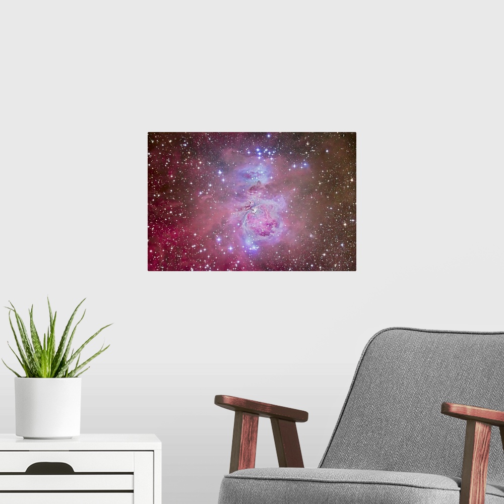 A modern room featuring The Orion Nebula, M42 and M43, with surrounding associated nebulae and star clusters, such as the...