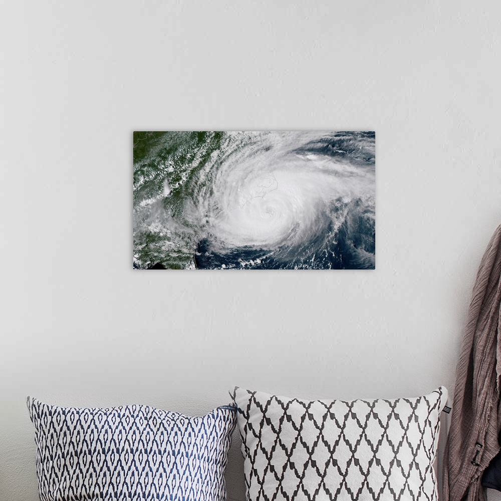 A bohemian room featuring The outer bands of Hurricane Florence battering the North Carolina coast.