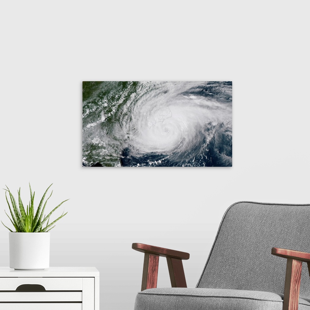 A modern room featuring The outer bands of Hurricane Florence battering the North Carolina coast.