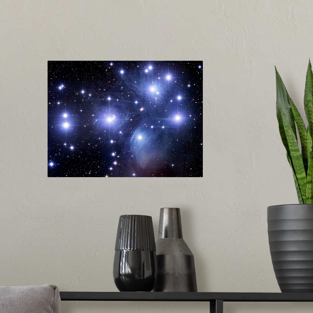 A modern room featuring Large photograph taken of the Seven Sisters, an open star cluster located within the constellatio...