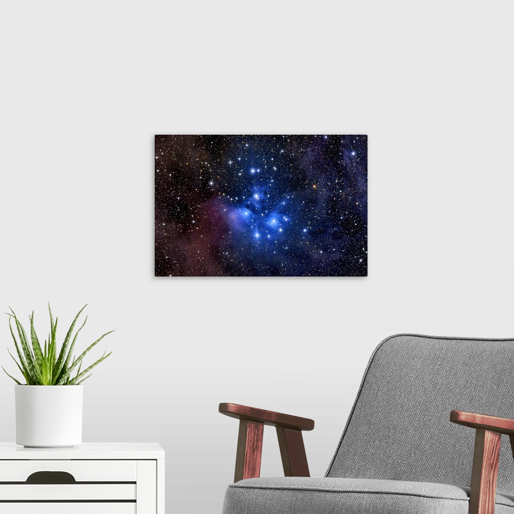 A modern room featuring Photograph of star filled night sky.