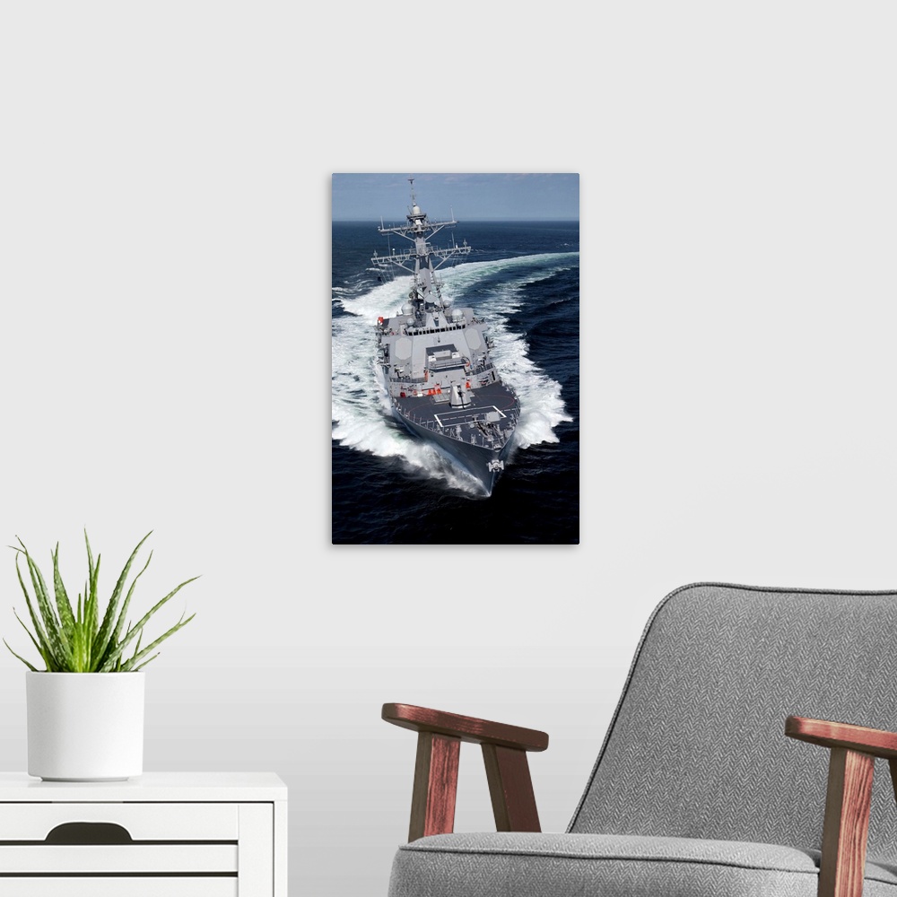 A modern room featuring The Pre-Commissioning Unit Jason Dunham conducts sea trials in the Atlantic Ocean.