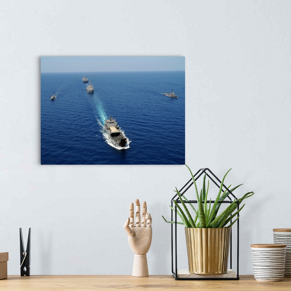 A bohemian room featuring The Republic of the Philippines Navy ships cruise in formation while taking part in exercise Bali...