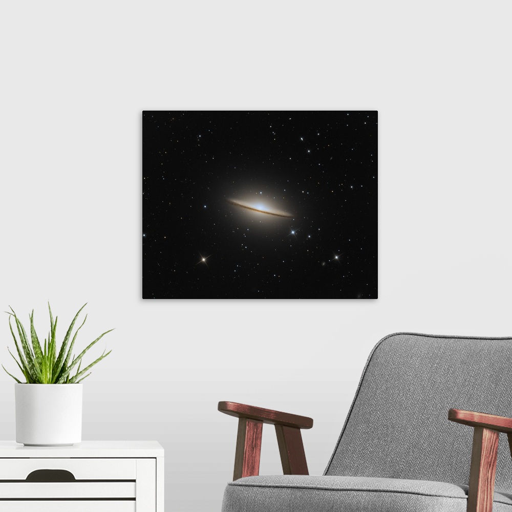 A modern room featuring The Sombrero Galaxy.