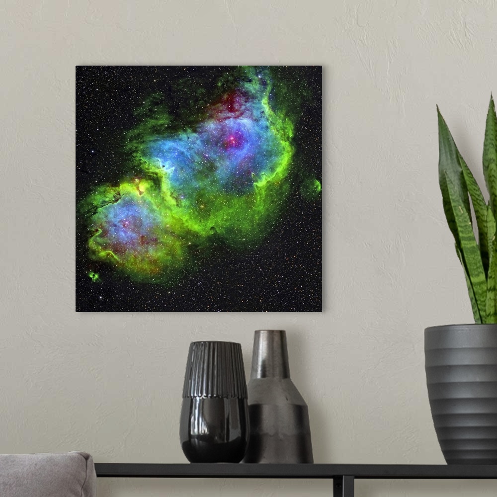 A modern room featuring IC 1848, the Soul Nebula in Hubble-palette color mapping.