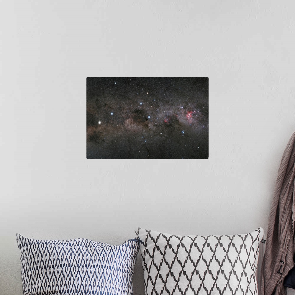 A bohemian room featuring Stars and planets dot the dark sky of a photo of the Milky Way.