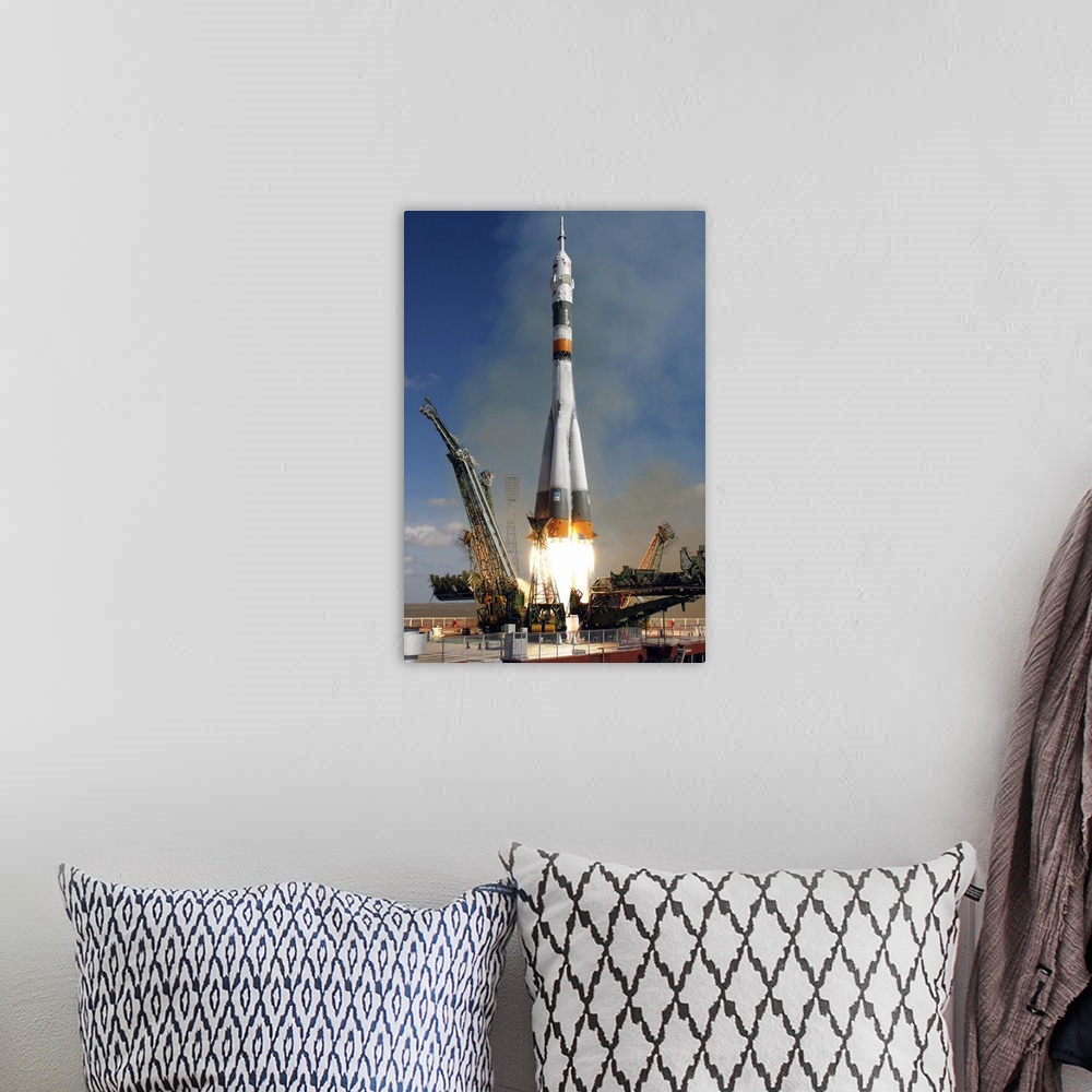 A bohemian room featuring The Soyuz TMA13 spacecraft launches from the Baikonur Cosmodrome in Kazakhstan