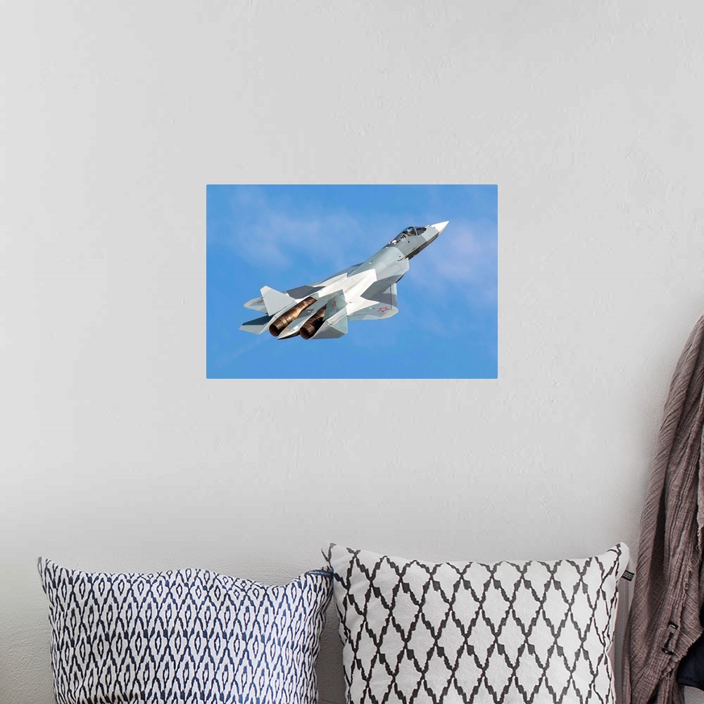 A bohemian room featuring The Sukhoi T-50 future Russian Air Force 5th generation fighter plane.