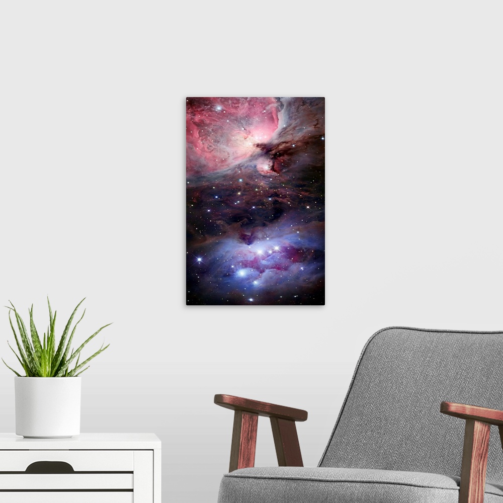 A modern room featuring Large photograph depicts a portion of space littered with brightly filled stars, three of which m...