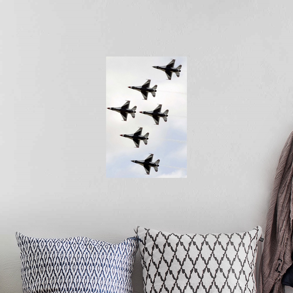 A bohemian room featuring The Thunderbirds form a 6ship Delta formation