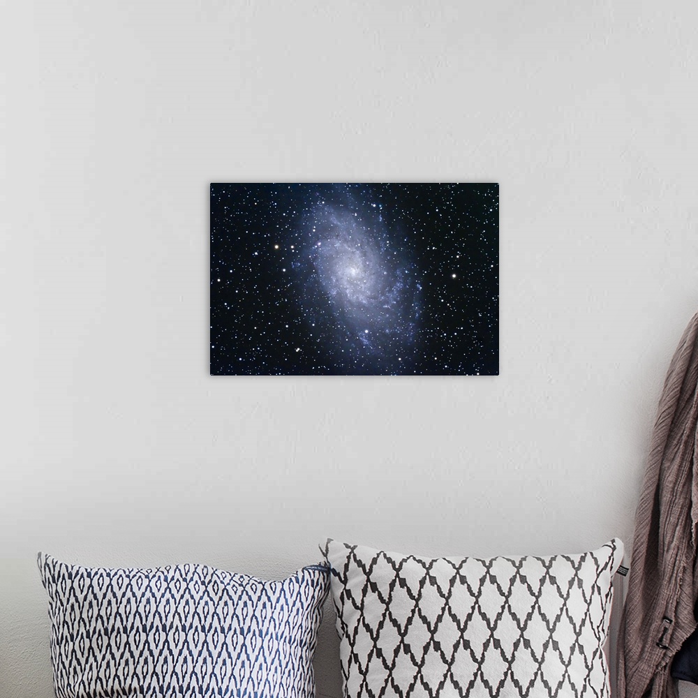 A bohemian room featuring The Triangulum Galaxy (NGC 598) in the Local Group of galaxies.
