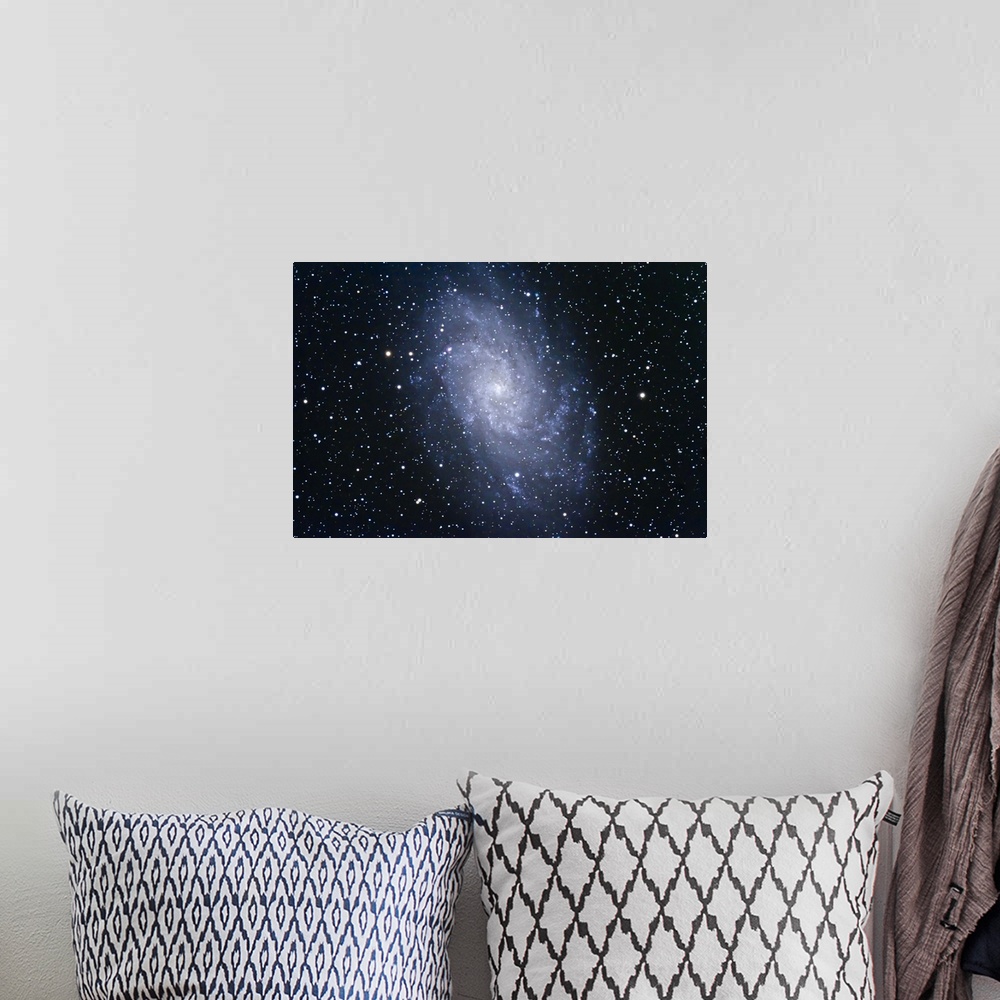 A bohemian room featuring The Triangulum Galaxy (NGC 598) in the Local Group of galaxies.