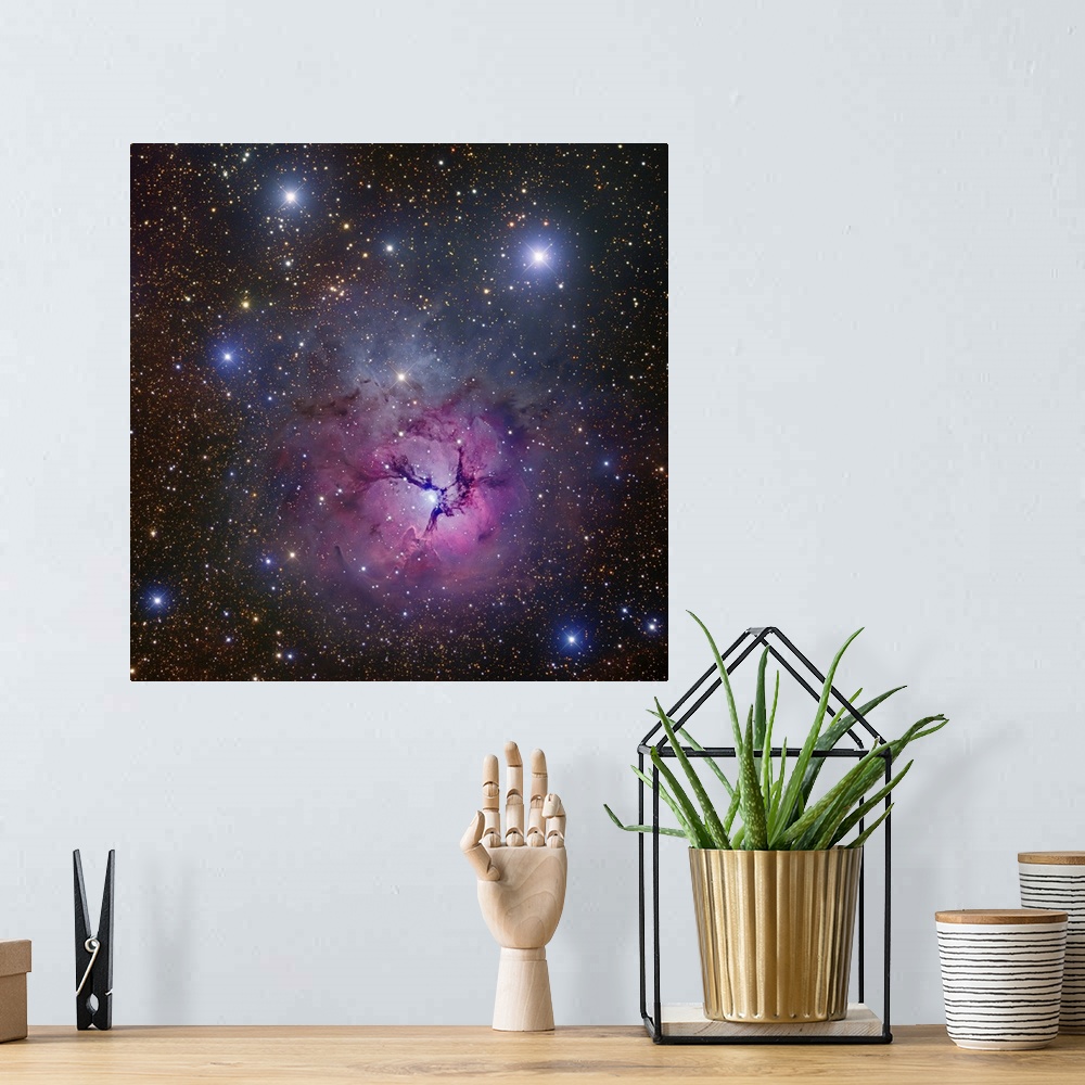A bohemian room featuring The Trifid Nebula located in Sagittarius