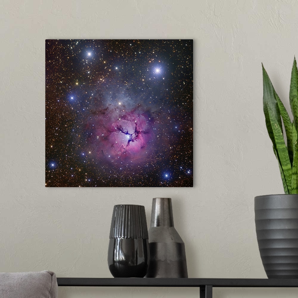 A modern room featuring The Trifid Nebula located in Sagittarius