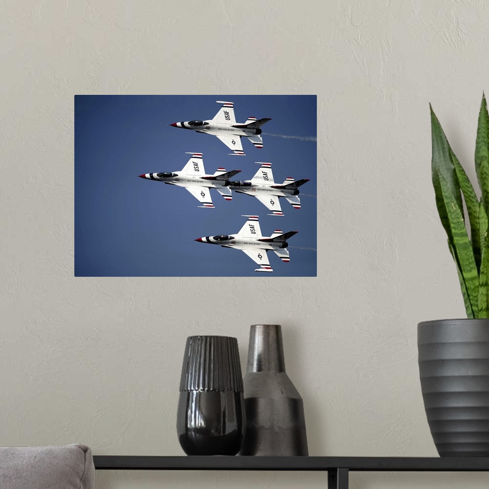 A modern room featuring April 9, 2011 - The U.S. Air Force Thunderbird demonstration team performs in their F-16 C/D Figh...