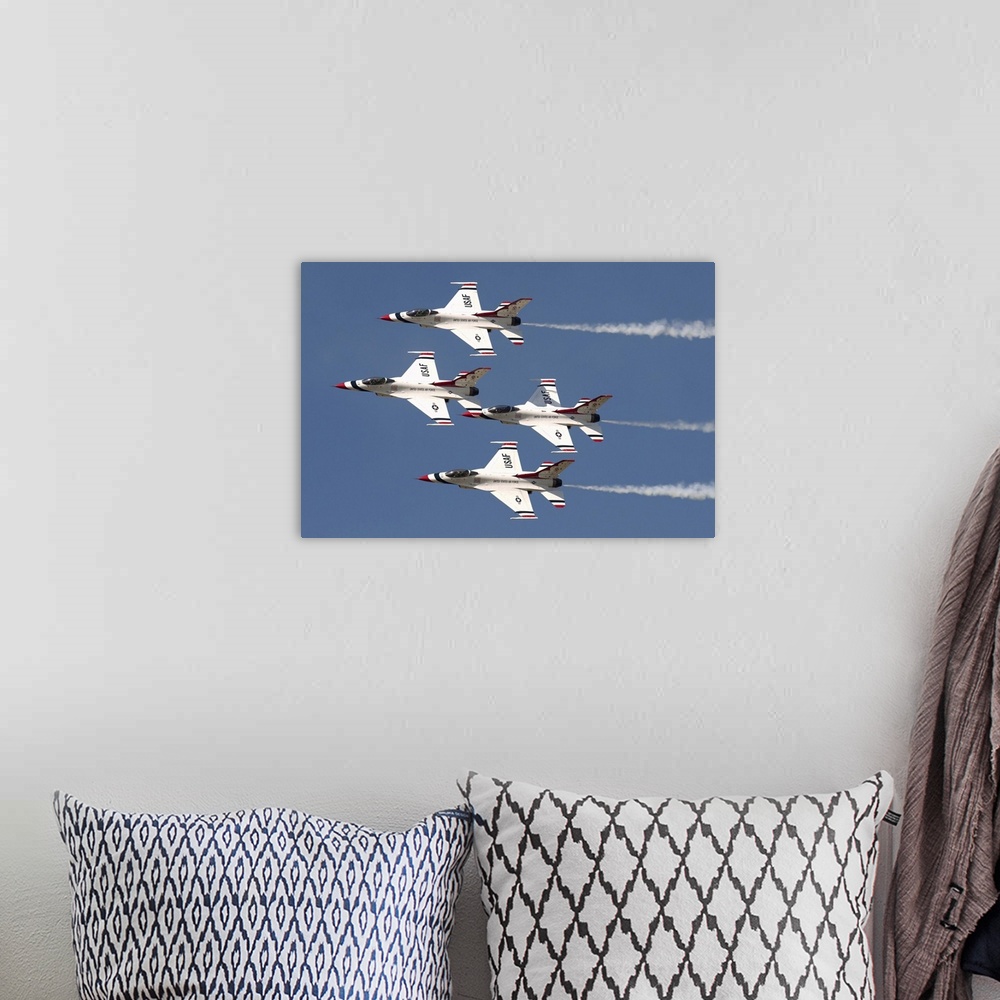 A bohemian room featuring The U.S. Air Force Thunderbirds fly in formation.