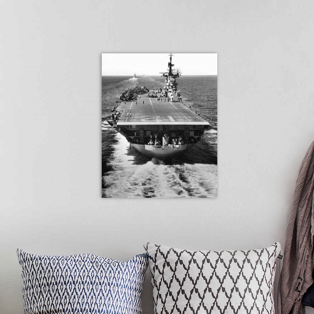 A bohemian room featuring The U.S. aircraft carrier USS Boxer operating off North Korea.