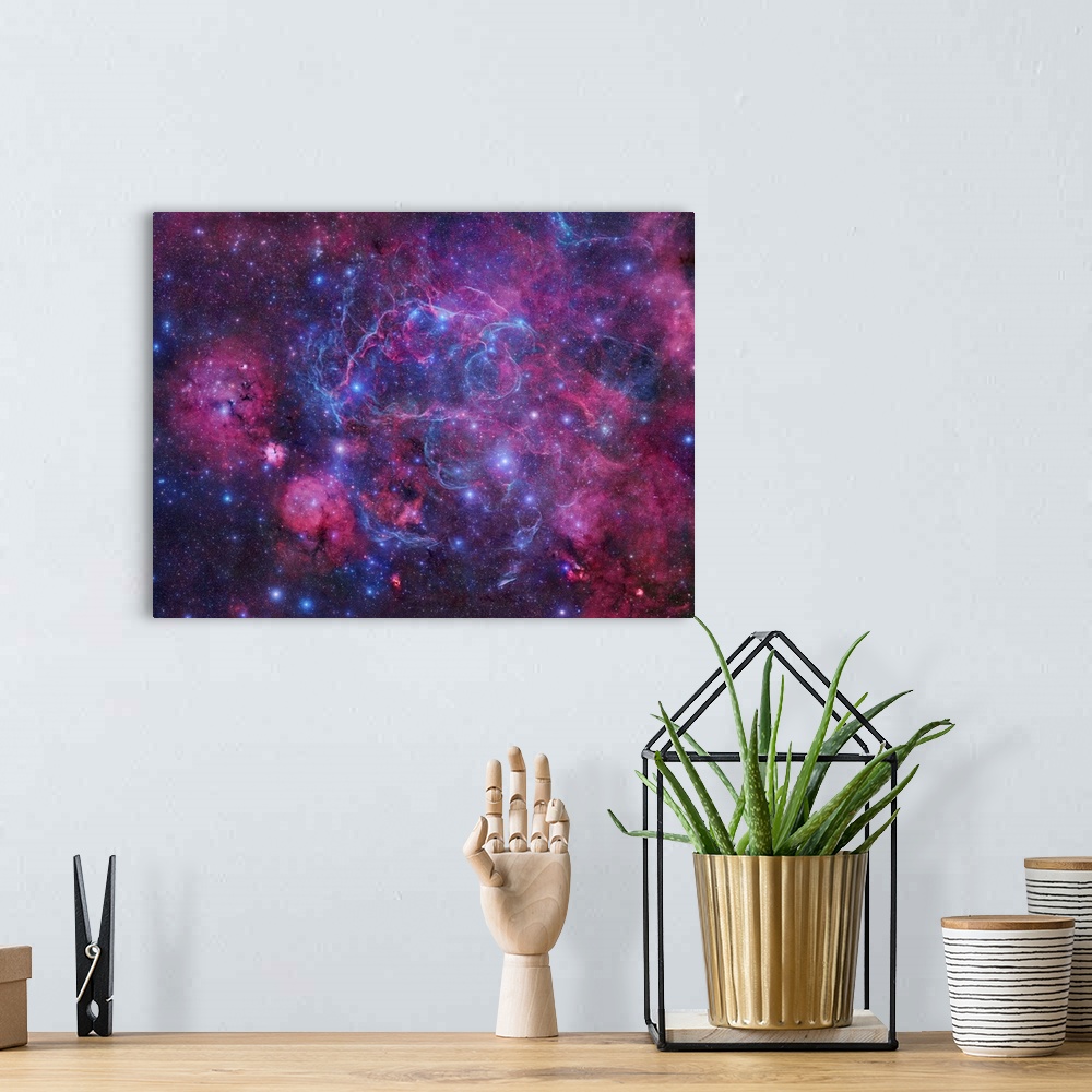A bohemian room featuring The Vela Supernova Remnant