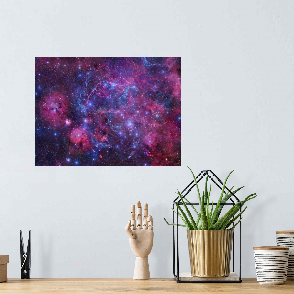 A bohemian room featuring The Vela Supernova Remnant