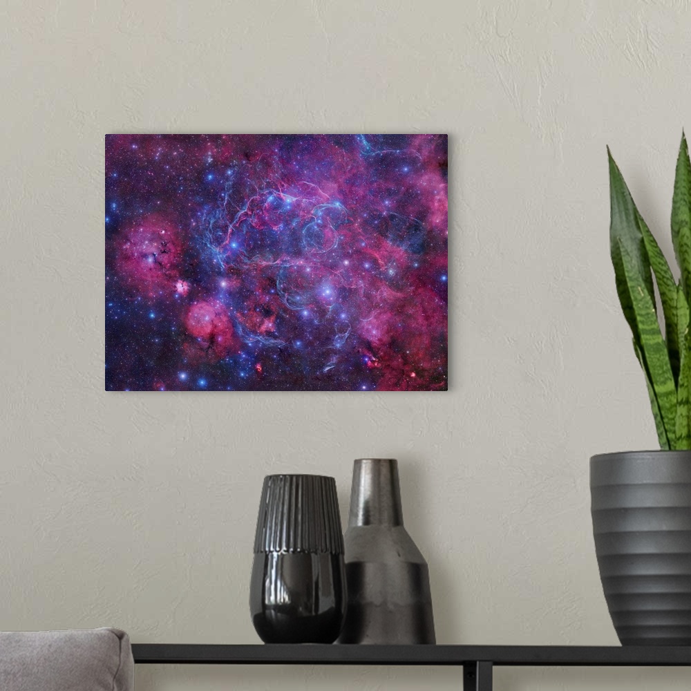 A modern room featuring The Vela Supernova Remnant