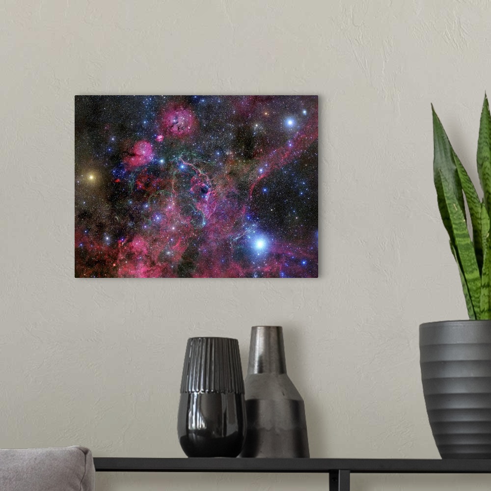 A modern room featuring The Vela supernova remnant