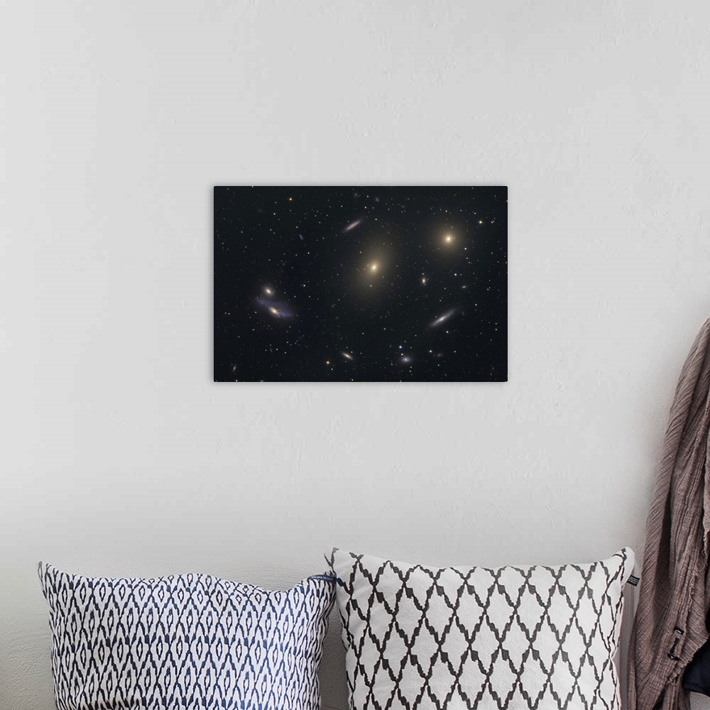 A bohemian room featuring The Virgo Galaxy Cluster known as Markarians Chain