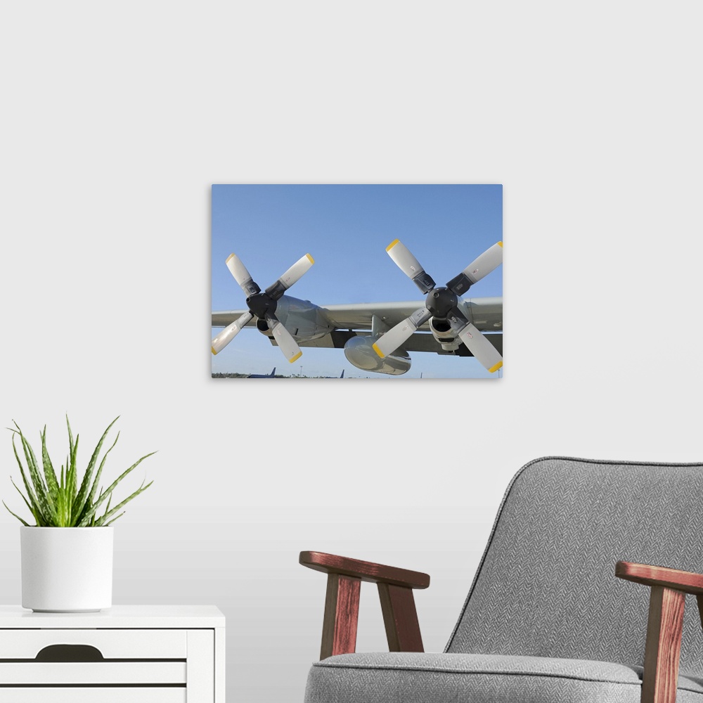 A modern room featuring October 18, 2010 - The wings of an LC-130 Hercules at Joint Base Pearl Harbor-Hickam, Hawaii. The...