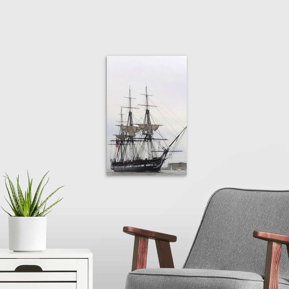 A modern room featuring Charlestown, Massachusetts, August 19, 2012 - The world's oldest commissioned warship, USS Consti...