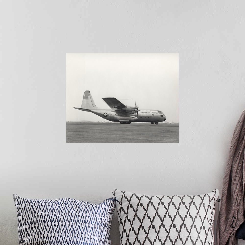 A bohemian room featuring August 23, 1954 - Archived photo of the YC-130 first flight from Burbank, California.