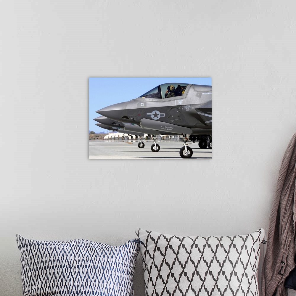 A bohemian room featuring Three F-35B Lightning II's at Marine Corps Air Station Yuma, Arizona.