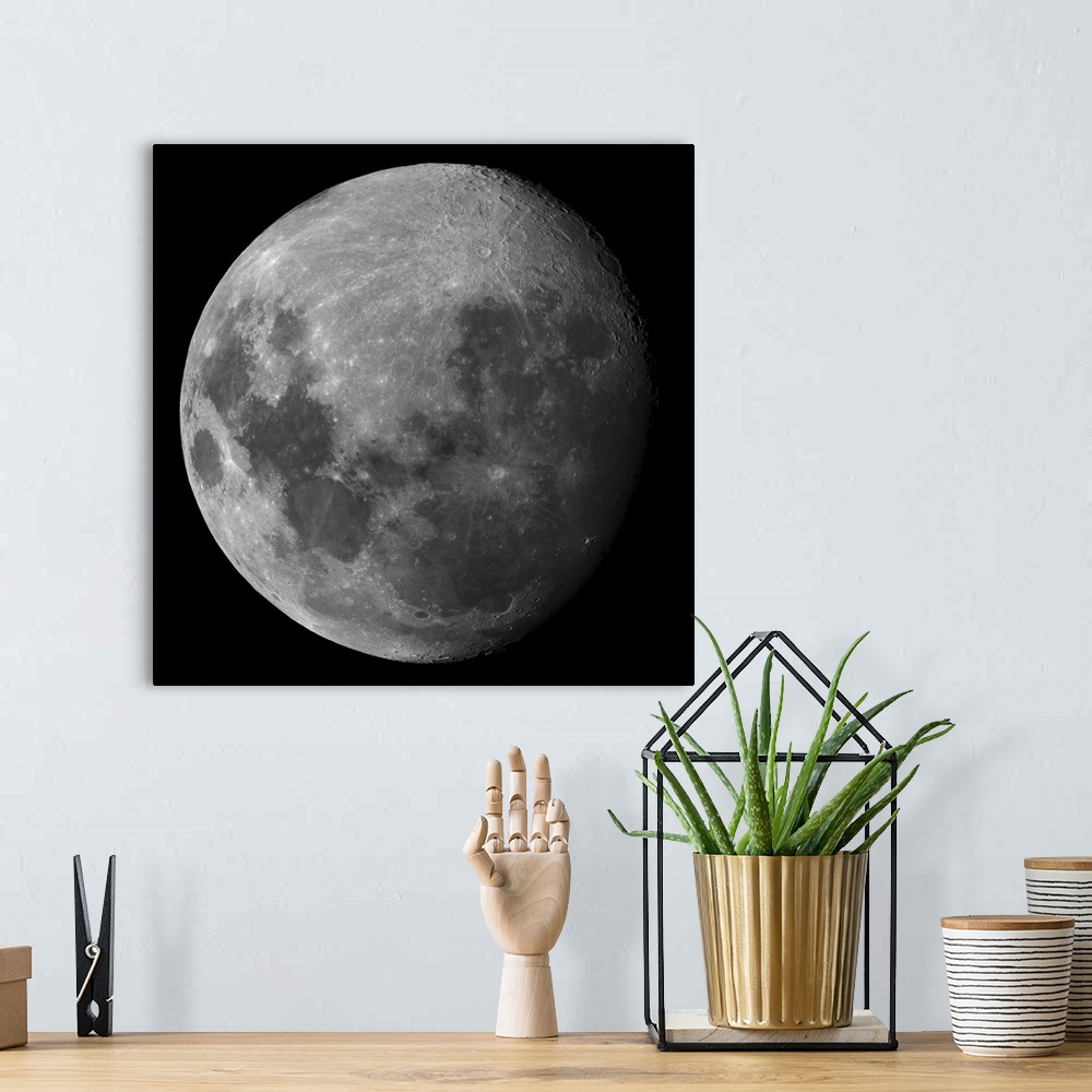 A bohemian room featuring Big canvas print of an up close view of the moon where you can see the details of the craters.